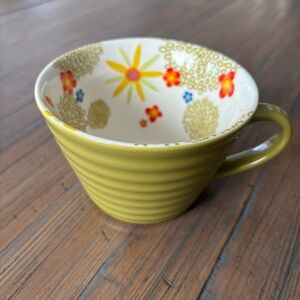 Starbucks Coffee 2007 ceramic 12 ounce mug with inner floral print & green